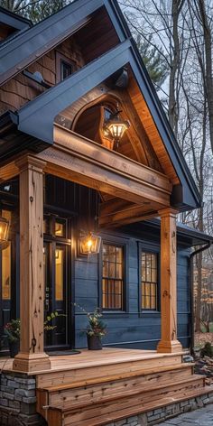 a small house with a porch and steps leading up to the front door