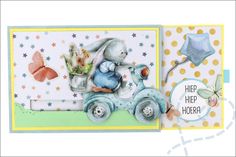 a card with an image of a bunny on a scooter and butterflies in the background