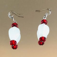 Red and white handmade beaded earring for all occasions White Faceted Beads Beaded Earrings Gift, White Faceted Beaded Earrings As A Gift, White Beaded Earrings With Faceted Round Beads, White Faceted Beaded Round Earrings, White Czech Glass Dangle Earrings, White Round Beaded Earrings With Faceted Beads, Handmade White Earrings For Christmas, Elegant White Christmas Earrings, Handmade White Christmas Earrings