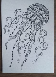 a black and white drawing of a jellyfish with intricate designs on it's head