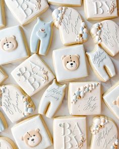 baby shower cookies with teddy bears and other decorations