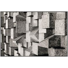 a black and white photo of an abstract wall