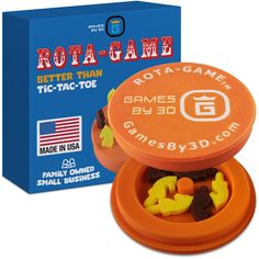 an orange game box with gummy bears in it next to a blue package for better than ti - tac - tac - toe