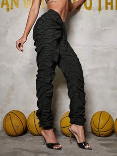 Explore the great outdoors or go for a casual event in style with these Drawstring Cargo Jogger Pants! Crafted from lightweight fabric and featuring a classic drawstring waist in a bold and elegant black color, they offer the utmost comfort and a perfect fit. So whether you’re strolling in the park or tackling a trail, do it in style. Details: Color: Black Style: Casual Pattern Type: Plain Type: Jogger Closure Type: Drawstring Waist Waist Line: High Waist Length: Long Fit Type: Regular Fit Fabri Black Stretch Pants With Functional Drawstring, Black Drawstring Cargo Pants For Spring, Spring Black Cargo Pants With Drawstring, Black High-waisted Cargo Pants With Drawstring, Black Drawstring Pants For Summer, Black Drawstring Summer Pants, Black Summer Pants With Drawstring, Stretch Nylon Cargo Pants With Drawstring, Black Drawstring Bottoms For Fall