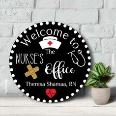 a black and white sign that says welcome to nurses the nurse's office