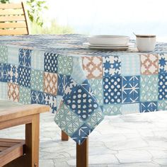 a table covered with blue and white tiles