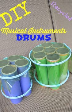 two buckets filled with drums sitting next to each other on a couch that says diy musical instruments drums