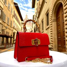 This bag has been made of the best genuine leather by local master crafters of Florence in Italy, designed for women who only accept premium Italian quality and luxury leather bags and modern Italian fashion. . Sizes: Width:   22 cm/8.75 inch Height:  16 cm/6.25 inch Depth:    7  cm/2.75 inch . The story of this bag : In the heart of Florence, nestled among the cobblestone streets and artisanal workshops, there was a quaint little shop known for its exquisite leather goods. Amongst the array of handcrafted treasures, one particular item stood out--the Italian Leather Tote Bag. Crafted meticulously by skilled artisans, this leather tote bag exuded elegance and sophistication. Its buttery soft texture and rich aroma of genuine Italian leather drew admirers from far and wide. Each stitch told Designer Luxury Orange Bags, Luxury Elegant Orange Bags, Luxury Elegant Orange Bag, Leather Bags For Women, Orange Handbag, Luxury Leather Bag, Handmade Leather Bags, Sac Week End, Red Purses