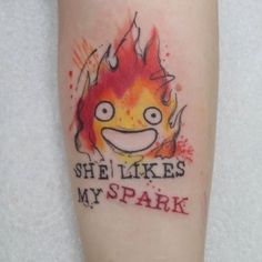 a tattoo with the words she likes my spark on it and a fire in the background