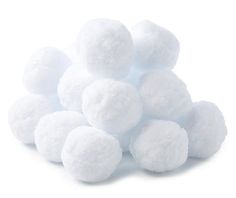 a pile of white cotton balls sitting on top of each other in front of a white background