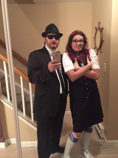 a man and woman dressed up for halloween