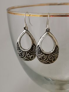 Antique silver style drop earrings. Silver plated, nickel free, hypoallergenic hooks. Boho earrings. Aztec silver earrings. Silver loop drop earrings. Silver Sterling Earrings With French Hook, Sterling Silver Earrings With French Hook, Antique Silver Drop Earrings, Silver Teardrop Hoop Earrings With French Hook, Silver Dangle Hoop Earrings With French Hook, Silver Drop Metal Jewelry, Metal Drop Hoop Earrings With Ear Wire, Metal Teardrop Drop Earrings, Silver French Hook Earrings As Gift