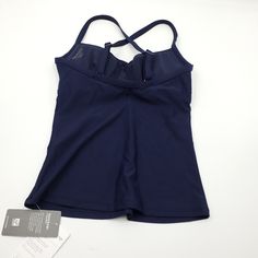 Nwt. Color Is Dress Blue, Which Is A Navy. For: Swim, Surf, Stand-Up Paddleboard, And All Water Sports Feel: Recycled Heco Swim Fabric Is Sleek With Powerful Stretch. Fave: Fully Adjustable X-Back Straps. Removable Cups Are Amazing In Two Ways: 1) They're Our Fastest Drying Cups, Ever; 2) They Never Fold Over And Maintain Their Perfect Shape. Best For B-Dd Cups. Medium Support For B-Dd. Medium Coverage. Mid-Rise Neckline Strikes The Balance Between Concealed. #386329 Blue Sleeveless Activewear With Built-in Bra, Stretch Sleeveless Swim Dress For Workout, Sleeveless Stretch Swim Dress For Workout, Sporty Sleeveless Tankini For Sports, Fitted Sleeveless Swim Dress For Sports, Sporty Sleeveless Tankini For Yoga, Sporty Sleeveless Tankini For Workout, Stretch Sleeveless Swim Dress For Sports, Sleeveless Stretch Swim Dress For Sports