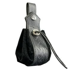 a black leather bag with a metal buckle on it's side and a cord attached to the handle