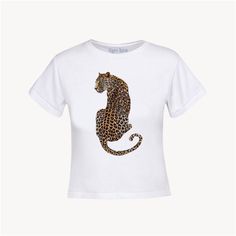 Introducing 'Leopardo' baby tee.  ★ This is a short fit graphic tee (baby-tee) meaning its not too long, not too cropped, but just the perfect length to be your next go-to tee.  ★ Soft and durable, 100% cotton fabric  ★ We offer worldwide shipping - all of our tees are made to order and shipped locally to you. * CARE INSTRUCTIONS * - Machine wash recommended cold 30C or 90F - Do not bleach  - Tumble dry recommended low heat  - Iron, steam or dry: low heat  * DELIVERY * - Standard UK shipping is Y2k 90s Aesthetic, Cheetah Baby, Leopard Baby, Leopard Graphic, Graphic Baby Tee, Baby Leopard, Cute Leopard, Baby Graphic Tees, 90s Aesthetic