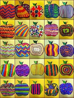 an art project with many different colored pumpkins and apples on it's sides