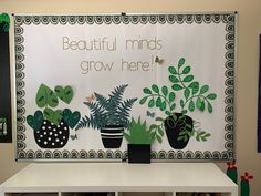 there is a sign that says beautiful minds grow here