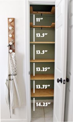 an open closet door with measurements for the doors and shelves on each side, along with a pair of scissors