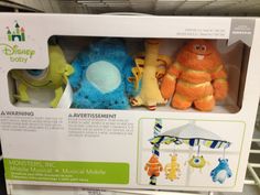 three stuffed animals are in the box for sale