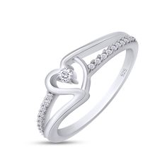 a white gold heart shaped ring with diamonds on the sides and two hearts in the middle