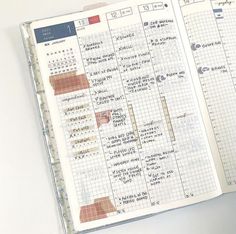 an open planner book with japanese writing on the pages and numbers in each section,