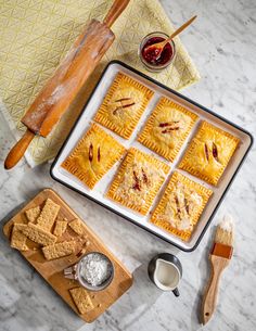 peanut butter and jelly breakfast tarts on baking pan Pop Tart Recipe, Breakfast Tarts, Toaster Pastries, Poptart Recipe, Breakfast Tart, Toaster Pastry, Pop Tart