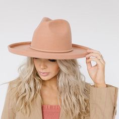 Pure sophistication worth every penny. The Cara Loren is a classic fedora with a wide, pencil roll brim. Features include a gold Gigi Pip X Cara Loren pin attached at the back of the crown + a custom satin lining. Style - Pencil Roll Brim Fedora Material - 100% Australian Wool Dimensions - Crown: 11.5 cm + Brim: 9 cm Fedora Hat Outfits, Nashville Outfit, Cara Loren, Gigi Pip, Pencil Roll, Dope Hats, Rancher Hat, Fedora Hat Women, Nashville Outfits