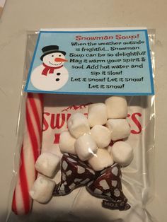 a bag of marshmallows with a candy cane