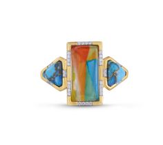 an art deco ring with blue, yellow and orange stones in the center on a white background