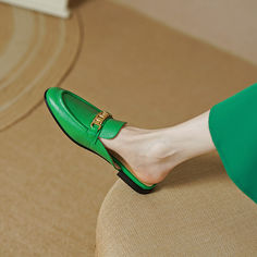 Handmade from premium leather. these loafer mules are really comfortable and breathable. Boasting chain decoration. these green mules help you show an easy chic look. Upper: Genuine Leather Lining: Genuine Leather Outsole: TPR Toe: Round Toe Closure: Slip on Color: White. Royal Blue. White is_handmade: Yes Elegant Green Slip-on Mules, Green Slip-on Mules, Green Slip-on Loafers For Office, Casual Green Pointed Toe Mules, Green Slip-on Loafers For Work, Chic Green Slip-on Mules, Chic Green Mules With Flat Heel, Chic Green Loafers For Spring, Chic Green Leather Mules