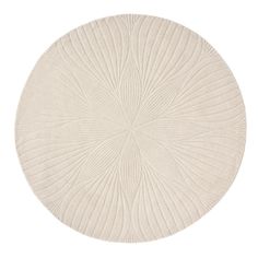 a white circular rug on a white background