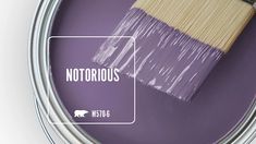 a paint can with a brush in it and the words notaroous painted on it