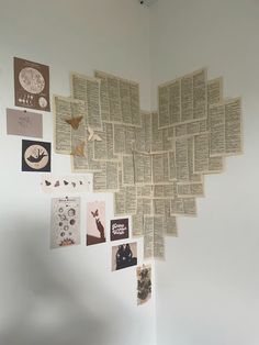 several pieces of paper are hanging on the wall