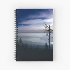 a view from the top of a mountain at dusk spiral notebook