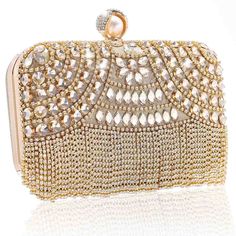 PRICES MAY VARY. Rhinestone Evening Bags is made of high quality satin and alloy, the surface is designed with a combination of sparkling crystals rhinestone and fashionable tassels, which is very luxurious and dazzling. Tassel Crystals Bags has magnetic snap button and detachable chain, enough room for daily basics like smartphones, credit cards, cash, keys, mini perfumes, makeup products.(Size:8.3*2.0*5.1inch). Bling Crystal Clutch Purses, it is a great choice for wedding, party, prom, dinner, Mini Perfumes, Prom Dinner, Rhinestone Clutch, Crystal Clutch, Crystal Bags, Gold Handbags, Evening Handbag, Sparkling Crystal, Bride Wedding