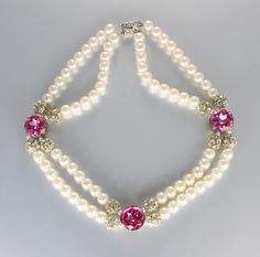 Bold, dramatic 1980s 8mm faux pearl necklace. What sets this piece apart is the combination of glittering rhinestone beads and 20mm pink glass stones. Necklace is 18 1/2 inches long and is in excellent condition. Box clasp is ornate and embellished with small clear rhinestones. 1980s Jewelry, Stones Necklace, Pearl Pink, Box Clasp, Faux Pearl Necklace, Rhinestone Bead, Pink Rhinestones, Rhinestone Necklace, Pink Glass