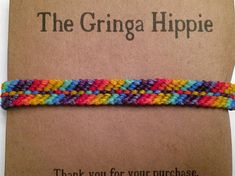 a colorful bracelet with the words, the grina hippie thank you for your purchase