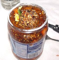 a jar of food sitting on top of a table