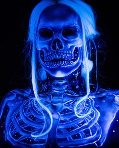 Blue glowing skeleton body paint with snowflakes around it Glow Skull Makeup, Uv Skeleton Makeup, Black Light Skeleton Makeup, Blacklight Halloween Makeup, Uv Makeup Halloween, Black Light Skull Makeup, Glow In The Dark Skeleton Makeup, Dnd Family