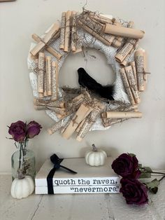 a wreath made out of wine corks with a bird sitting on top of it