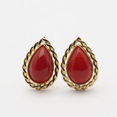 Rare finest ox-blood color.  There is a slight difference in shade of color. No scratches. Come with certificate. One of  a kind. First come, first served! This product is free upgrade shipping. Type of metal: Genuine 18K gold ※silicon backs Coral size: 9x5mm Motif size: 12x8mm Post length:10mm Post thickness:0.7mm Type of coral: Natural red coral from Japan(not dyed) Shape: Pear-Shape cabochon Scratches/dents/cracks: None 【 All corals dealing in our shop are natural 】 Not dyed, Not treated, Not Red Pear-shaped Earrings For Formal Occasions, Formal Red Pear-shaped Earrings, Classic Red Cabochon Earrings, Coral Jewelry, Akoya Pearls, Red Coral, Star Pendant, Natural Red, Pear Shape