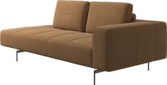 a brown couch sitting on top of a metal frame