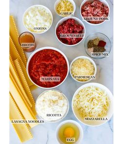 the ingredients for making spaghetti are shown in bowls on a marble countertop, including eggs, cheese and sauces