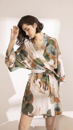 The perfect robe for your nightgown, bridal, or a special vacation. Check out the collection of dressing gowns in various colors, textures, patterns, and prints, including floral, silk, lace, and cotton material. #Kimono #KimonoOutfits #KimonoStyle #KimonoFashion #ModerneKimono #BridalKimono #WeddingKimono #NightGown #DressingGown Leaf Belt, Moda Kimono, Mode Kimono, Silk Kimono Robe, Printed Robe