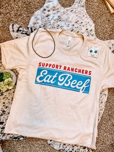 nothing we believe in more than supporting our ranchers! 100% cotton Unisex fit Bella canvas tee Cream colored tee Country T Shirts Ideas, Roots Clothing, Western Fits, College Shirt, Cowgirl Tuff, Eat Beef, Western Tee, Cute Country Outfits, Western Graphic Tees