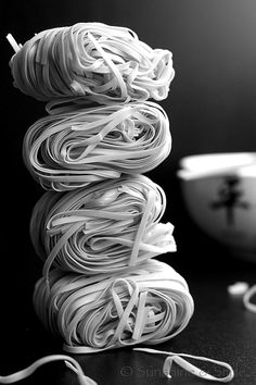 a stack of noodles sitting on top of a table