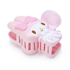 a pink hello kitty hair brush and comb set on a white background with the lid open