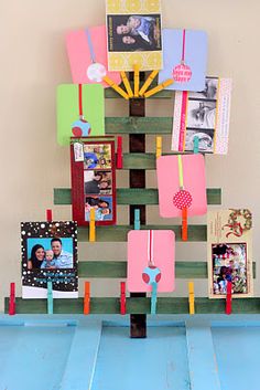 a christmas tree made out of scrapbook pages