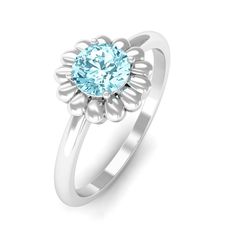 Product Details Blossom in elegance with this Solitaire Aquamarine Floral Ring. A delicate design that captures the essence of natures beauty and exudes a radiant charm. Product Information SKU SHP-RINGS082223753 Weight 2.30 gm (Approximate) AQUAMARINE INFORMATION No.of Stones 1 Pieces Total Weight 0.45 Carat (Approximate) Dimension(approx) Round-5X5 mm-1 Pcs Color Blue Cut Brilliant Shape Round Setting Type Prong-Setting Quality Grade AAA View More Product Parent Collection Handle aquamarine-rings White Gold Flower Ring With Birthstone, Elegant White Gold Flower Ring With Birthstone, Elegant Flower Shaped Birthstone Rings, Elegant Flower-shaped Birthstone Rings, Elegant Flower Shape Birthstone Rings, Floral Ring, Delicate Design, Aquamarine Rings, Flower Ring