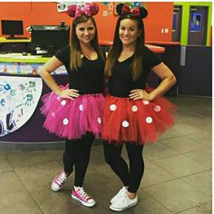 two girls dressed up in minnie mouse costumes